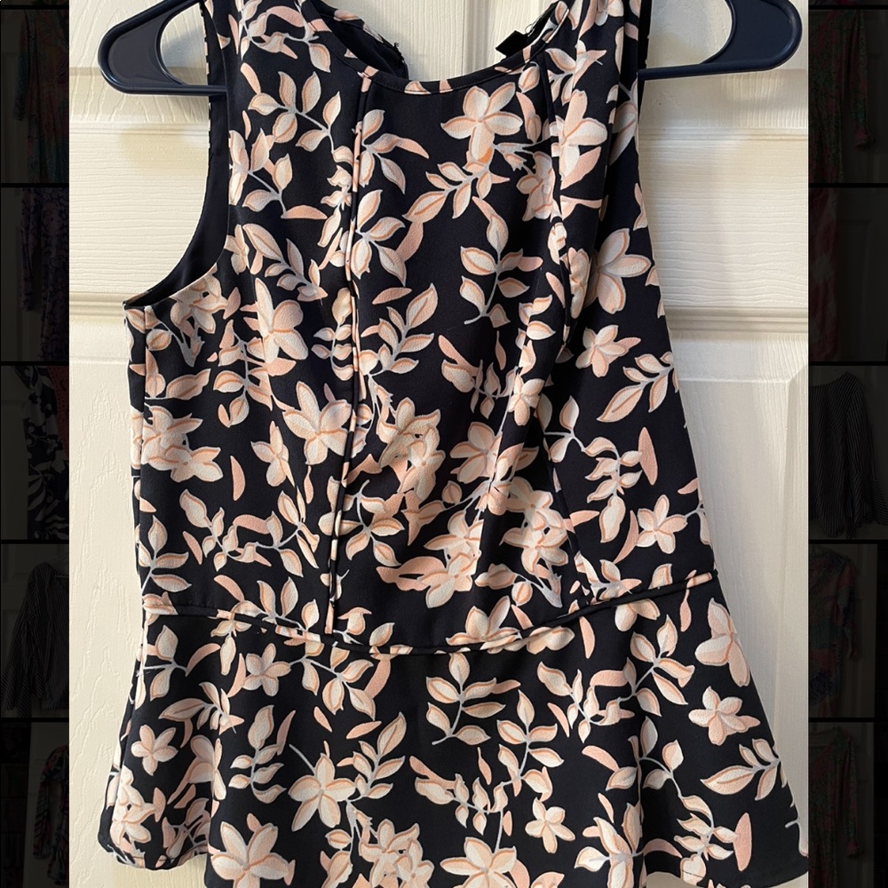 Peplum zip up top